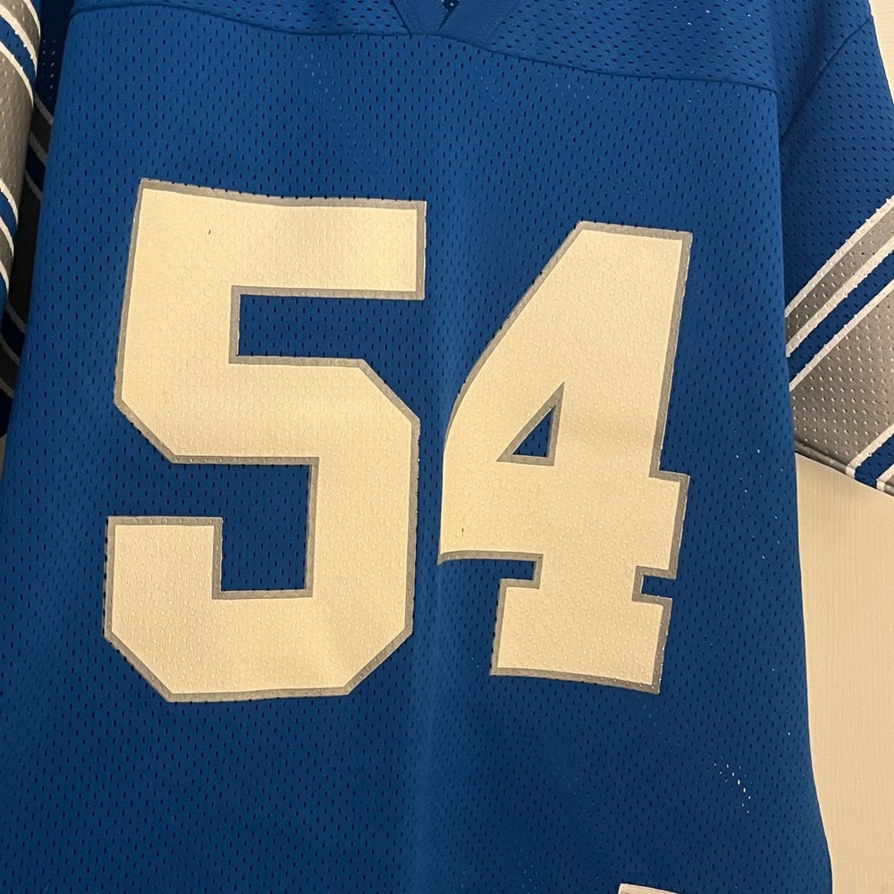 Blue Jersey with White Number 54